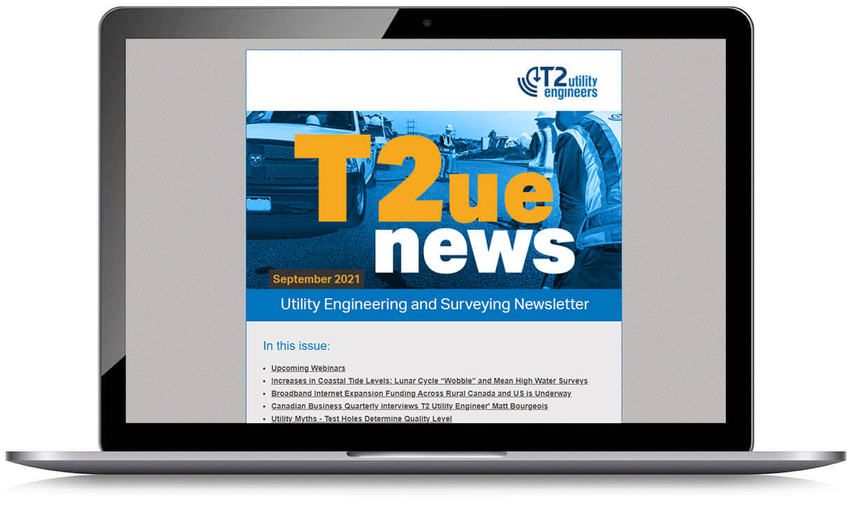 Image d'un ordinateur portable avec une capture d'écran du bulletin d'information T2ue News