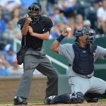 Umpire calling a strike at a baseball game